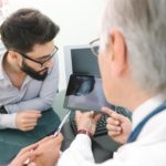 man-looking-at-lung-x-ray