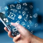 Smartphone-addiction-hand-and-smartphone