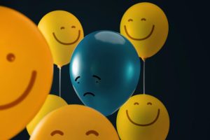 Happy-Sad-Balloon-Faces-Depression-Mental-Health-Antidepressant-Concept-1200x800